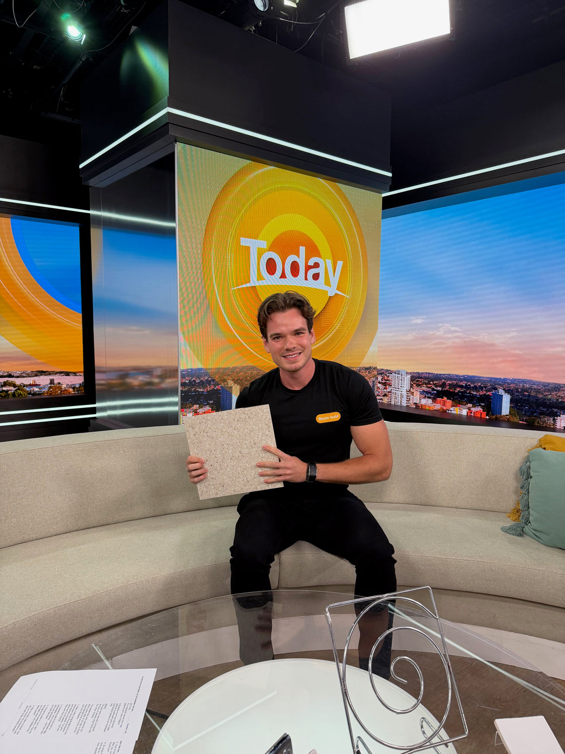 Jack Bloomfield holding a Bloom Build tile sample on the Today Show set